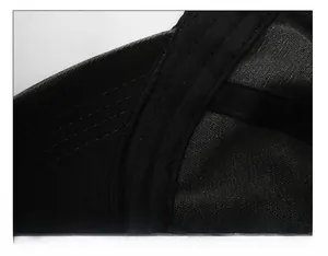 Detail view of the wide thickened sweatband and fine stitching inside the black baseball cap