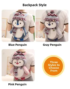 Cute penguin plush backpack for kids in blue, pink, and grey with knitted scarf and hat