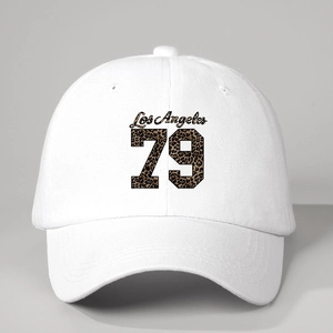 Close-up detail of Los Angeles 79 leopard print on white cotton baseball cap