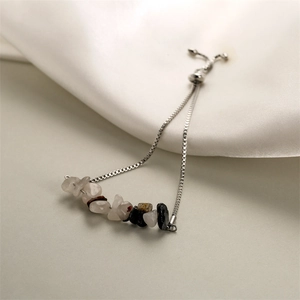 Detail of adjustable stainless steel box chain with colorful natural stone beads