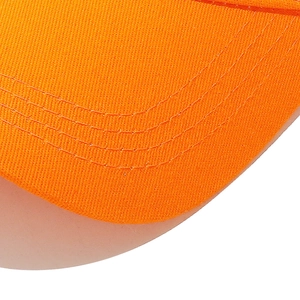 Detailed close-up of orange baseball cap brim featuring high-quality triple reinforced stitching