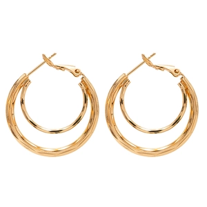 Gold layered geometric hoop earrings with textured diamond-cut and smooth polished rings