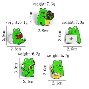 Size guide for green frog enamel pins showing weight and dimensions for each style