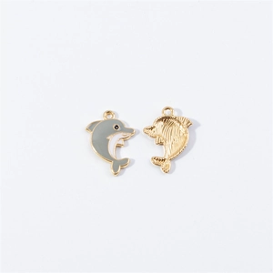 Detailed view of dolphin alloy pendants with grey enamel finish and golden textured back