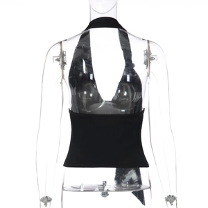 Detail view of black halter neck top featuring an open back design on a clear mannequin