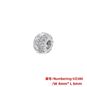 Detailed view of VZ380 hollow flower charm bead with 4x6mm dimensions and clear zircons