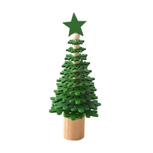 Green wooden mini Christmas tree ornament with snowflake design and solid wood base