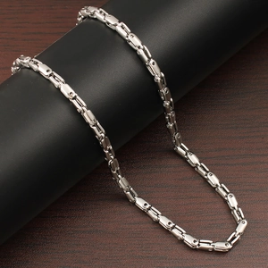 Detailed view of silver stainless steel necklace with geometric rectangular link design