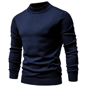 Close-up of navy blue knit texture and ribbed high neck collar on slim-fit sweater