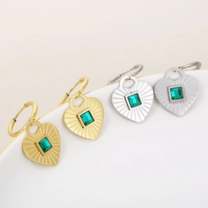 French vintage heart earrings with green zircon and radial sunburst texture