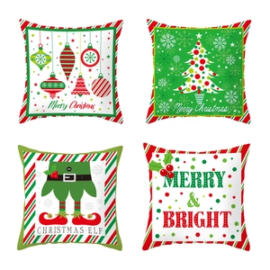 Set of 4 Christmas pillow cases featuring festive ornaments, trees, and holiday greetings