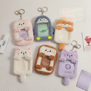 Detailed close-up of six plush animal photo card holders with transparent windows and hooks