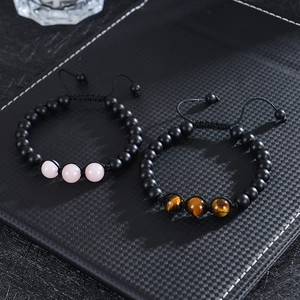 Braided natural stone bracelet with 8mm matte black beads and amethyst accent stones