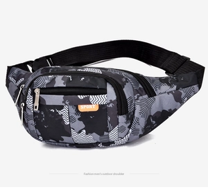 Detail of waterproof camouflage sports waist bag with adjustable strap and main compartments