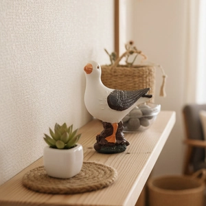 Nordic resin seagull model on dark rock base for home decor and photography prop