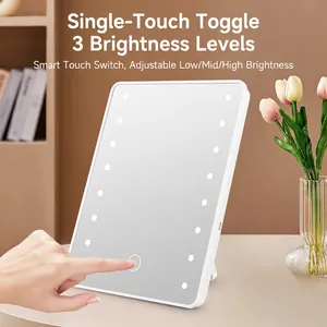 Minimalist desktop LED makeup mirror with 16 LEDs and touch sensor on a stylish desk