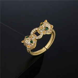 Adjustable 18K gold plated double leopard ring with micro-set zircon and green gems