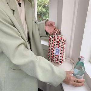 Trousse à maquillage en velours côtelé avec motif tulipes et poignée latérale