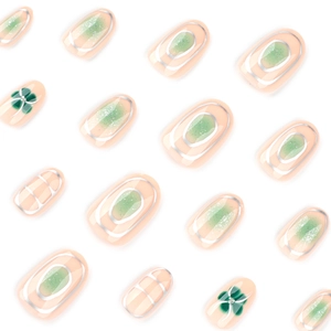 Fresh green gradient almond press-on nails set with floral patterns and silver accents