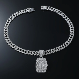 Close-up of hip hop silver Cuban chain necklace with iced out watch shaped pendant