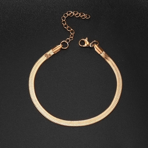 Macro detail of rose gold flat snake chain bracelet with adjustable lobster clasp