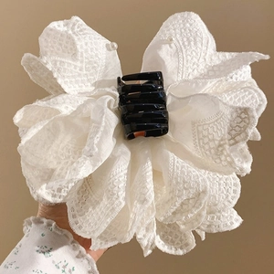Elegant white lace bow hair claw clip with pearls and floral fabric details