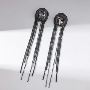 Macro shot of the black rhinestone tassel drop earrings with long crystal fringe details