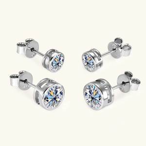Detailed close-up of S925 sterling silver hallmarking on six-prong moissanite earrings