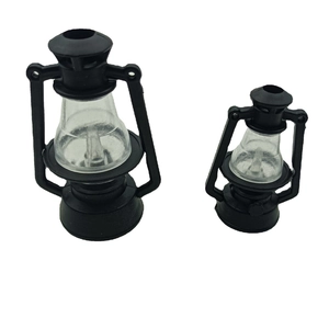 Set of two vintage black miniature lanterns in large and small sizes on white background