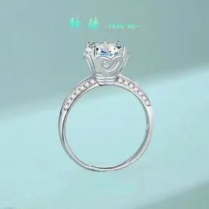 Detailed side view of S925 silver ring featuring heart-shaped prongs and 1ct moissanite