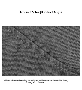 Close-up of double-needle stitching detail on black twill fabric of the flat top cap