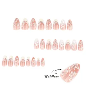 Elegant 3D floral press-on nails with white relief flowers and pearl accents on almond shape