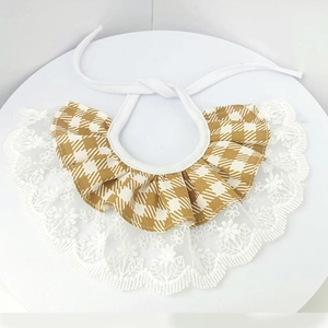 Plaid pattern dog bandana with lace trim and adjustable white ribbon neck strap