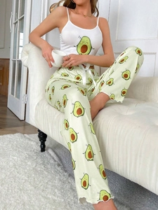 Detail of avocado print sleepwear set with camisole top and ruffled hem lounge trousers