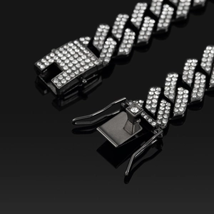 Macro detail of high-quality 14mm black cuban chain with sparkling rhinestones and buckle