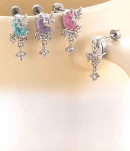 Macro shot of colorful ice zircon butterfly pendants on flat back titanium steel studs