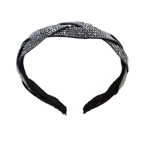 French style braided headband with sparkling rhinestones in black fabric on white background