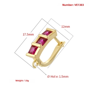 Detailed size specifications for gold geometric U-shaped earrings with red stone inlay