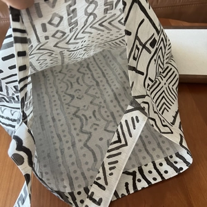 Detail view showing the spacious interior and bohemian geometric print on tencel cotton bag