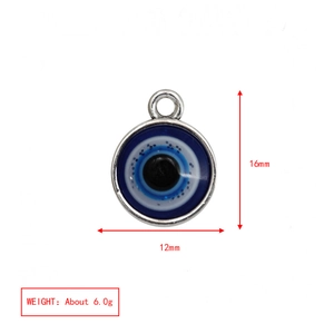 Blue evil eye triangle pendant with dimensions 16mm height and 12mm width on white background