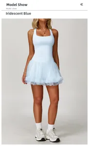 Detail of light blue racerback yoga set featuring multi-layered mesh skirt and fit design