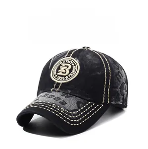 Detail of vintage washed black baseball cap featuring retro B-1926 circular embroidery