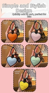 Macro detail of heart-shaped leather keychains in five vibrant colors with spiral lanyards