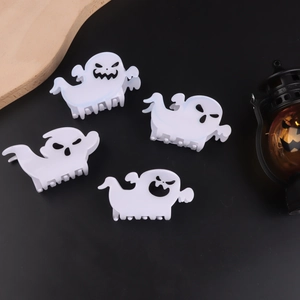 Set of four white ghost hair claws with different spooky expressions for Halloween