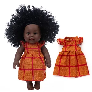 12-inch African American girl doll with afro hair and yellow plaid tie-dye dress outfit