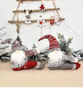 Detail of Christmas gnomes decor featuring knitted wool texture and festive scene