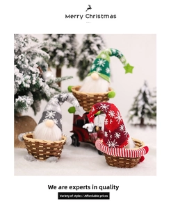 Close-up of three knitted Christmas gnomes with snowflake hats sitting in woven baskets