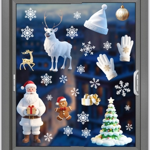 Detail of white 3D Christmas window stickers featuring snowman and snowflake designs