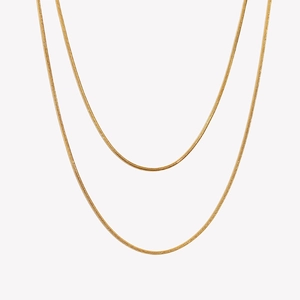 Elegant double-layered 18K gold-plated snake chain necklace with polished metallic finish