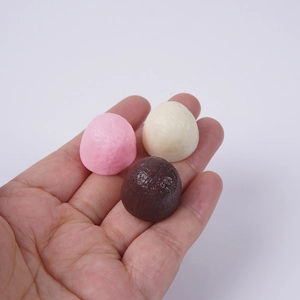 2cm realistic chocolate ball models for DIY cakes shown in pink, white, and brown
